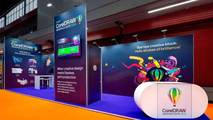 Exhibition stand with large printed graphic walls and a branded counter
