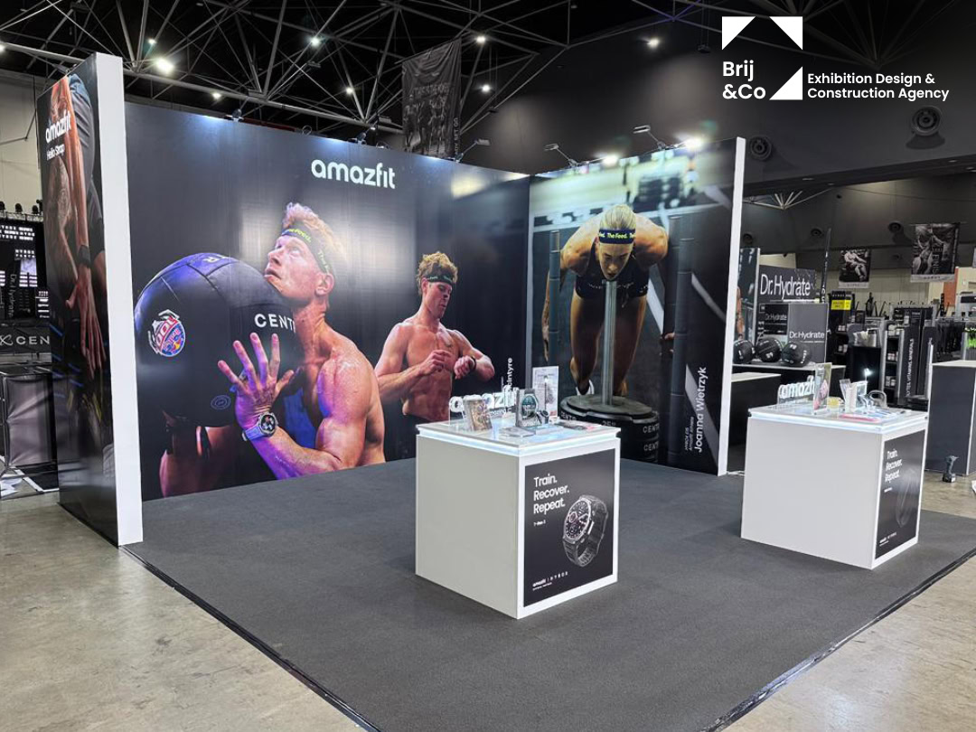 Amazfit exhibition stand with product plinths and printed backwall