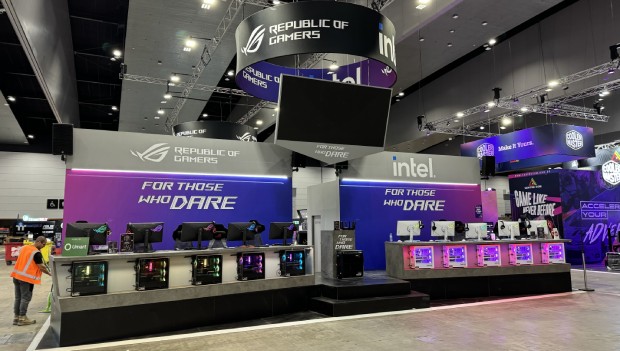 ASUS Republic of Gamers exhibition stand with purple-lit gaming counters