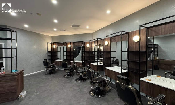 Barbershop fit-out in Port Macquarie with barber chairs, mirrors and black steel shelving