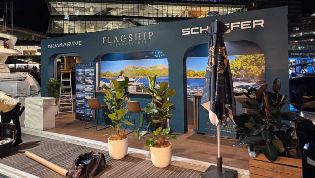 Flagship International exhibition stand with printed landscape backwall and planters