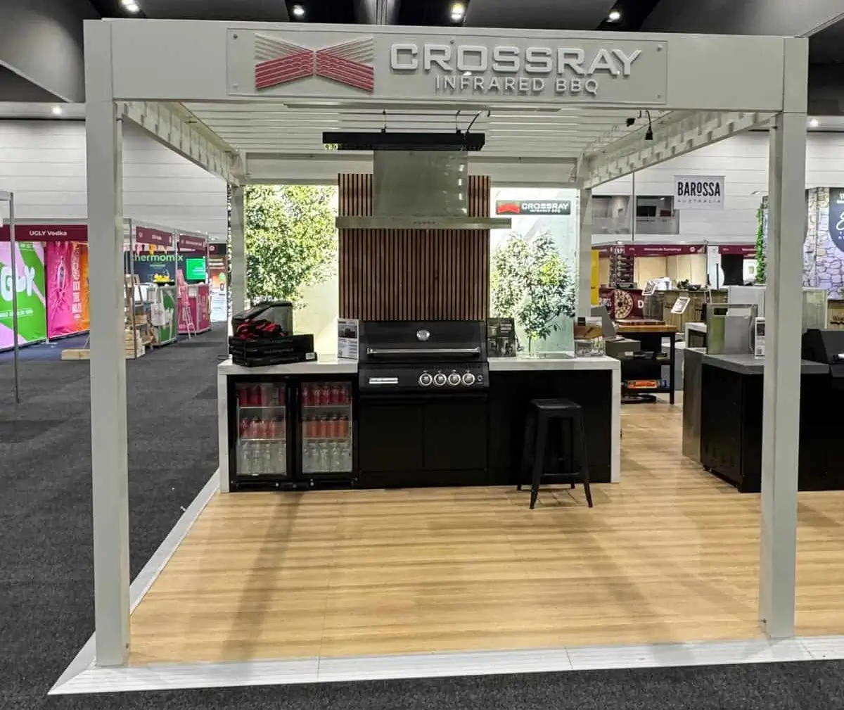 Crossray exhibition stand at the Good Food & Wine Show with outdoor kitchen displays