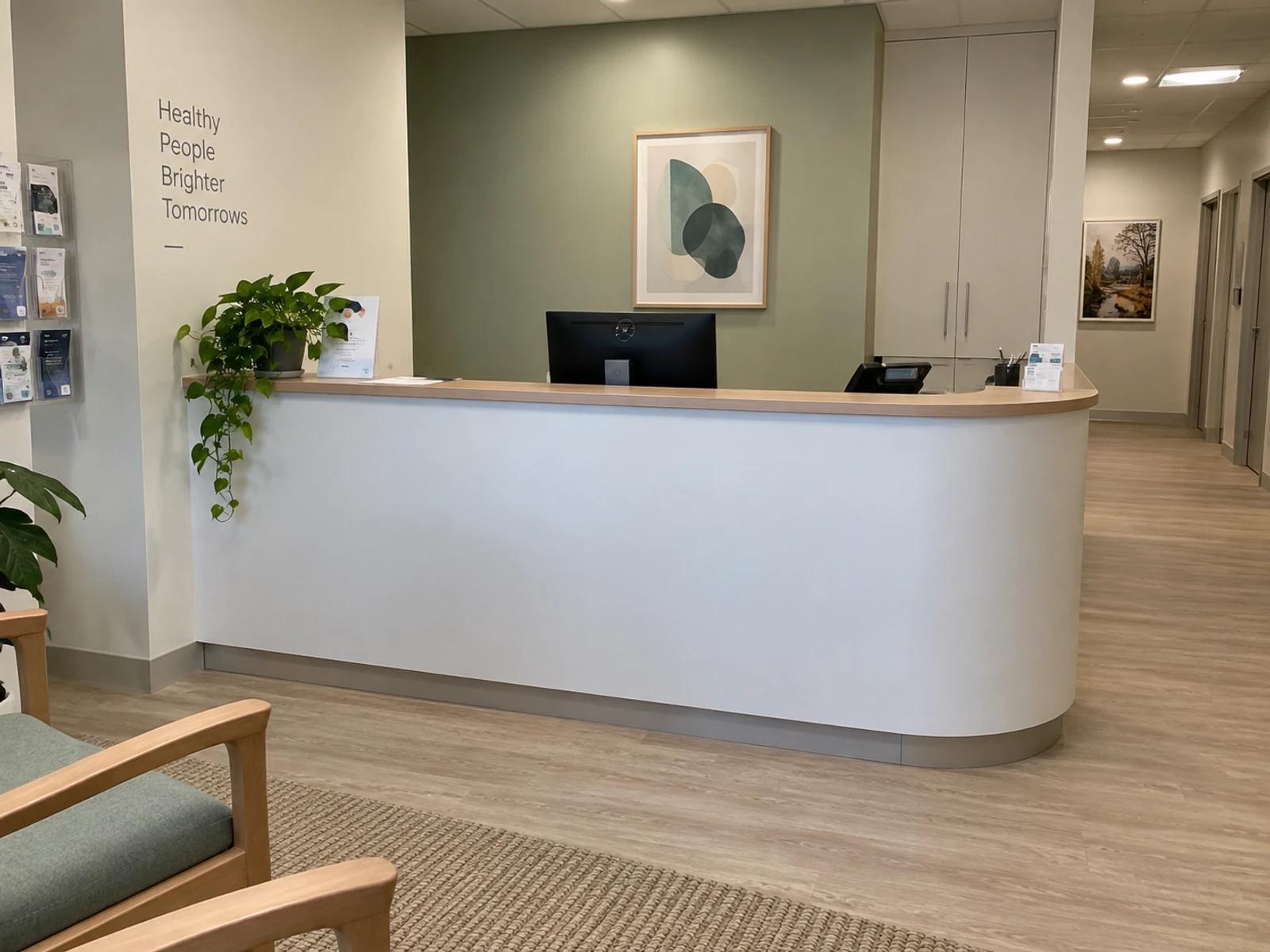 Custom clinic reception desk with white laminate front and rounded corners
