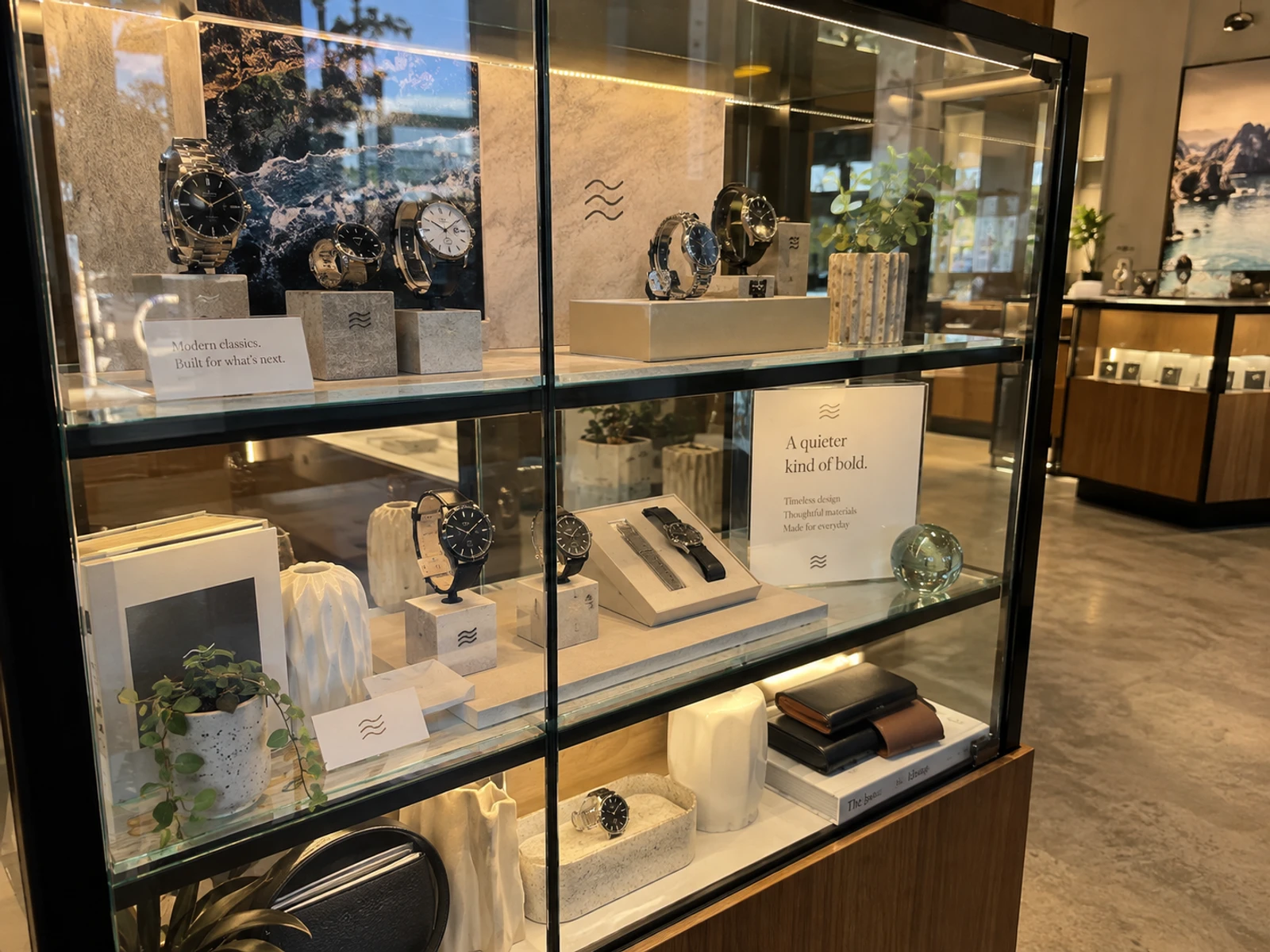 Custom glass-fronted display cabinet with LED lighting in a retail store