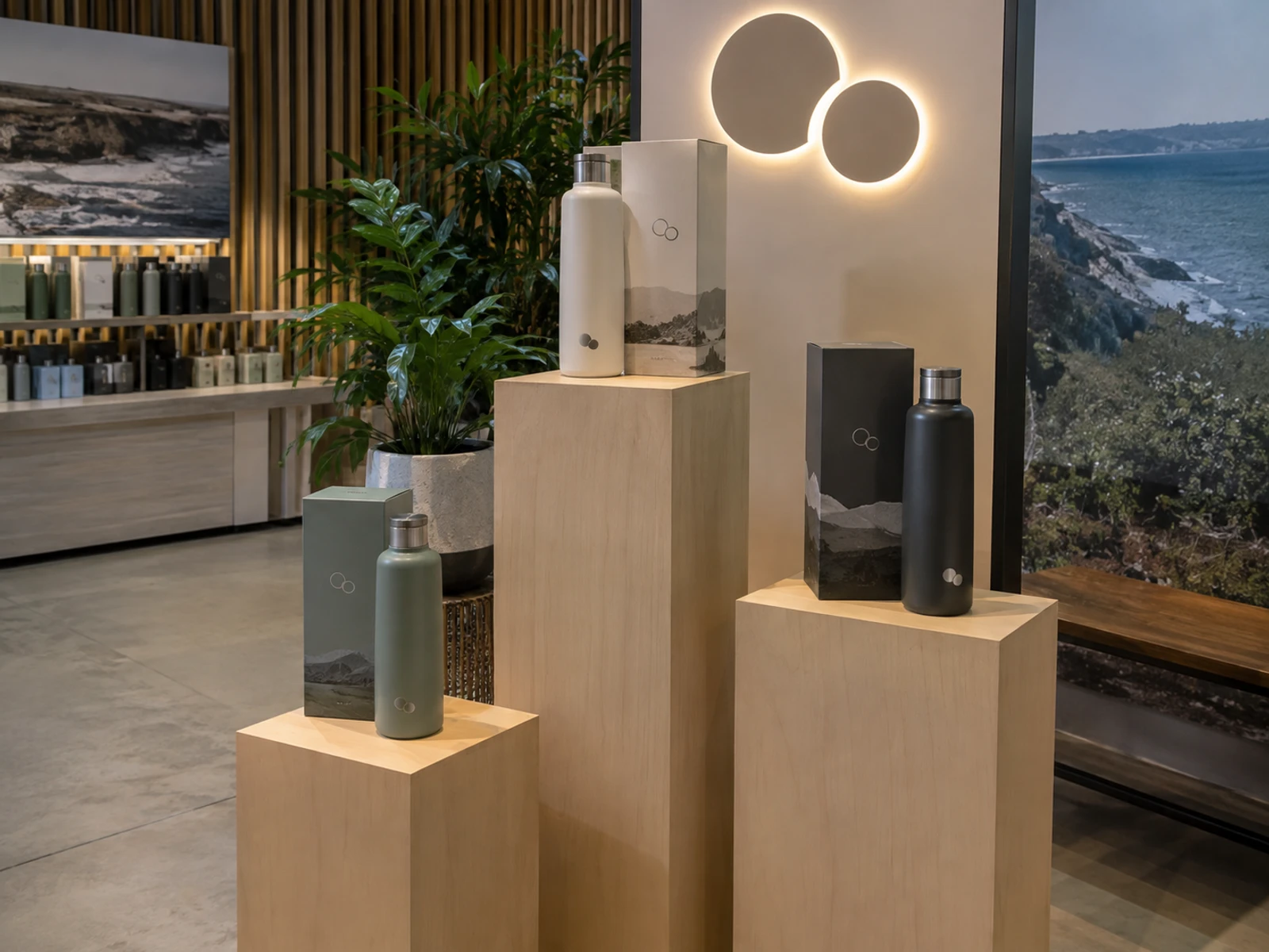 Custom timber plinths of different heights displaying products on a stand